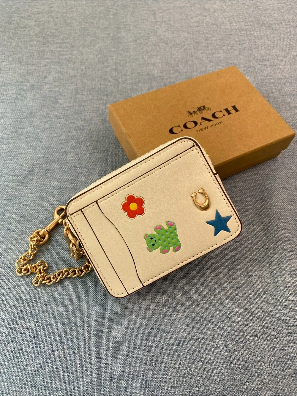 Coach Cream Card Holder with Gold Chain and Playful Charms